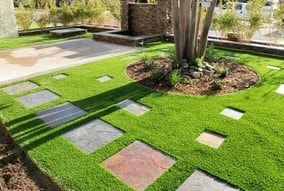 synthetic grass installed with designs